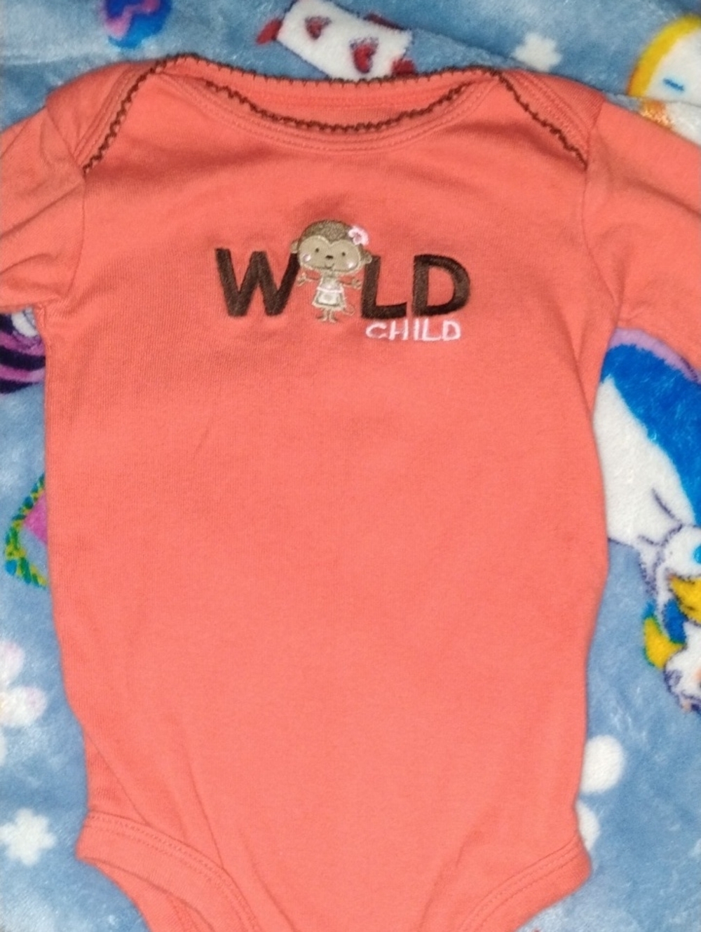 Coral 'Wild Child' Baby One-Piece Bodysuit